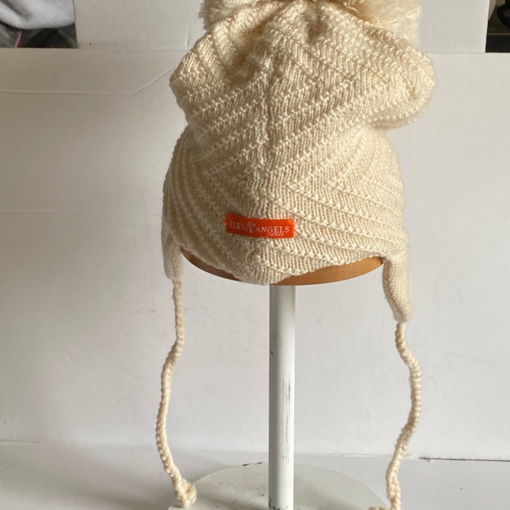 Winter knitted hat with large Pom Pom